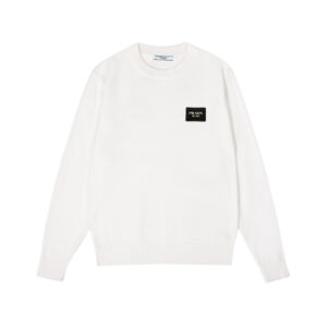 Prada's exquisite crew-neck sweater is a premium wool blend knitwear piece for women