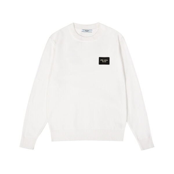 Prada's exquisite crew-neck sweater is a premium wool blend knitwear piece for women
