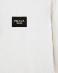 Prada's exquisite crew-neck sweater is a premium wool blend knitwear piece for women