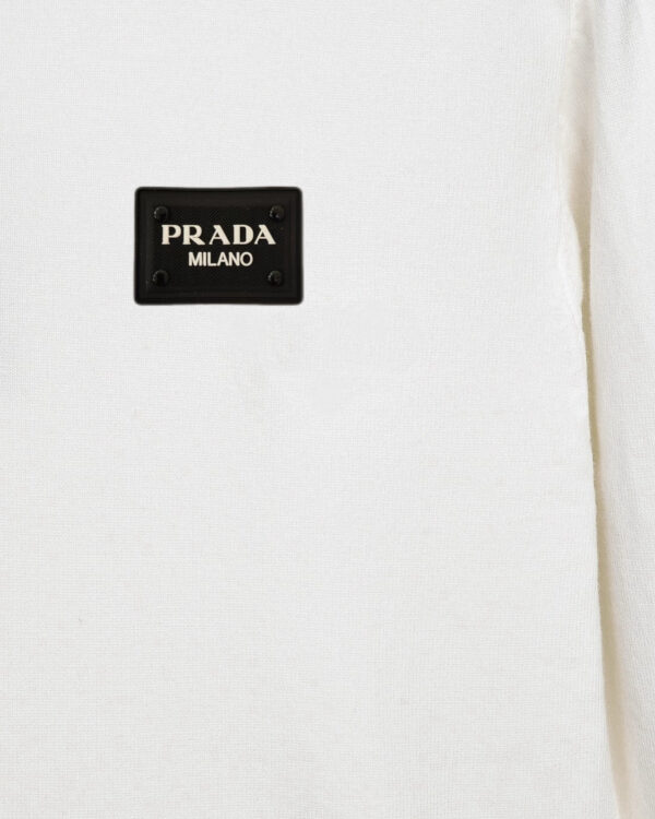 Prada's exquisite crew-neck sweater is a premium wool blend knitwear piece for women
